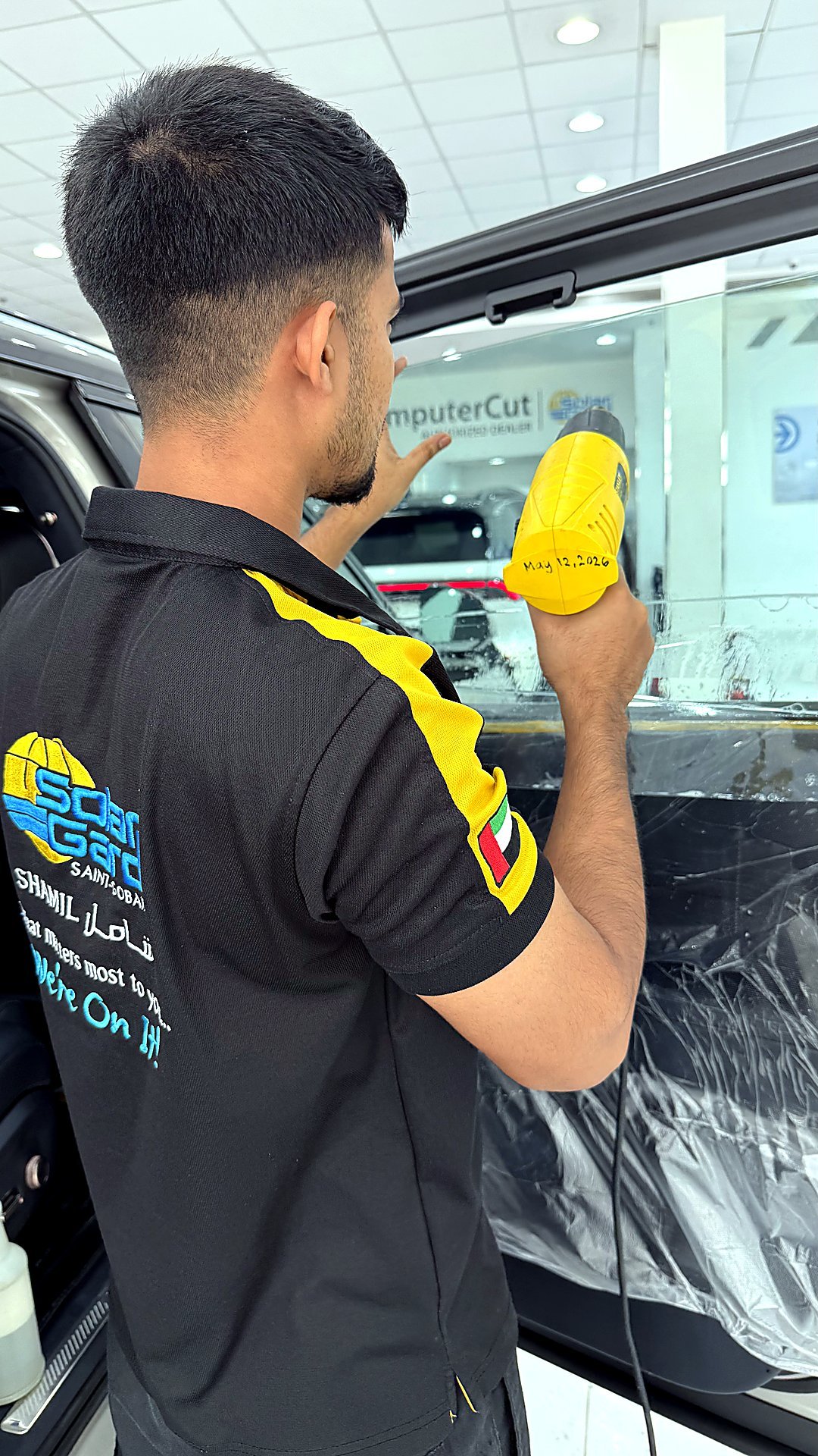 Solar Gard premium window tint — heat-forming installation, Shamil Trading