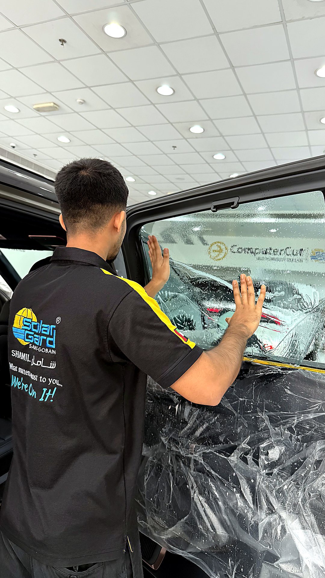 Solar Gard window tint installation in progress — Shamil Trading Sharjah